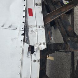 A truck trailer frame that is structurally broken