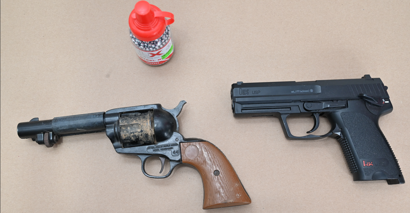 Three imitation firearms were seized as part of the investigation.