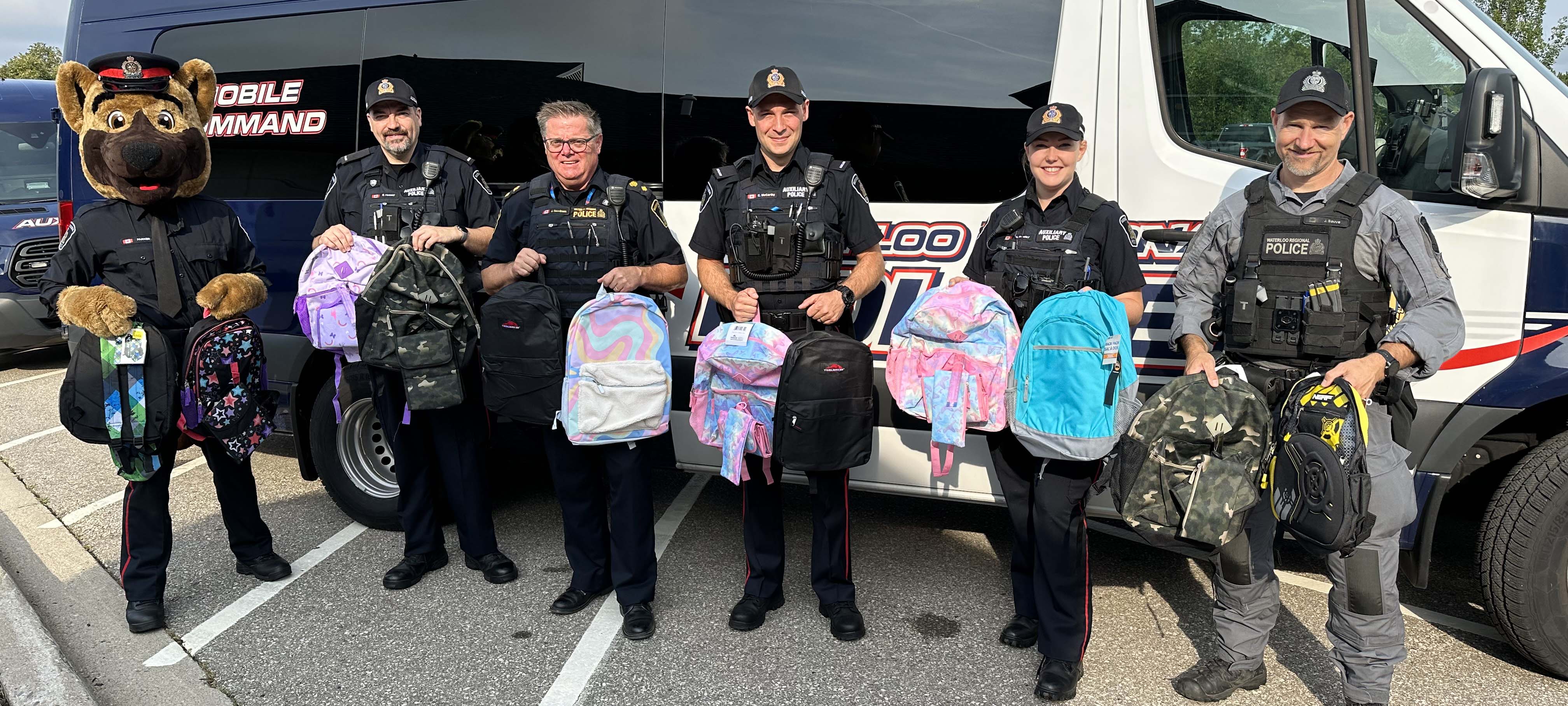 Officers with backpacks