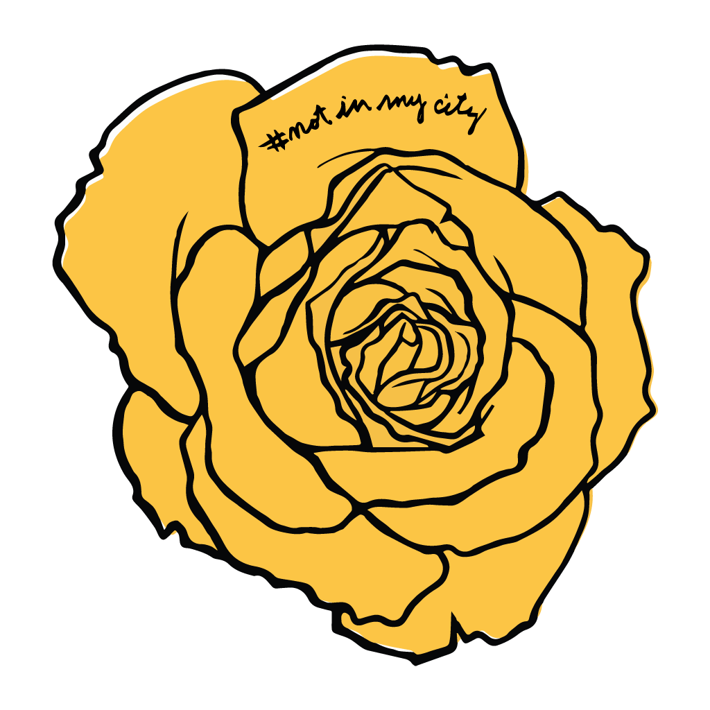 A yellow flower that reads "Not in my City" on it