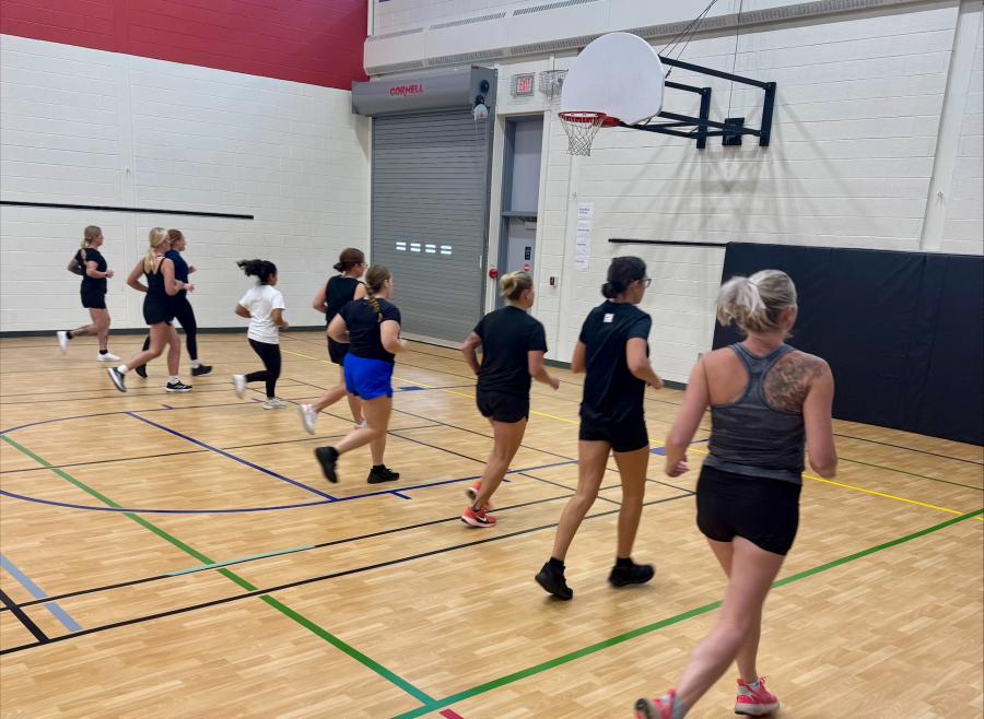 women running in gym