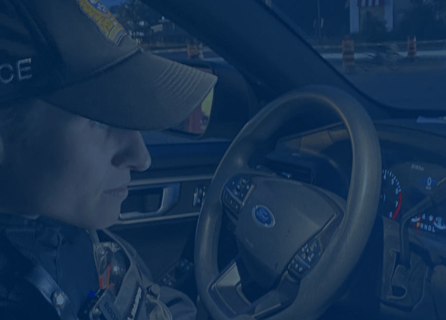 Officer in cruiser