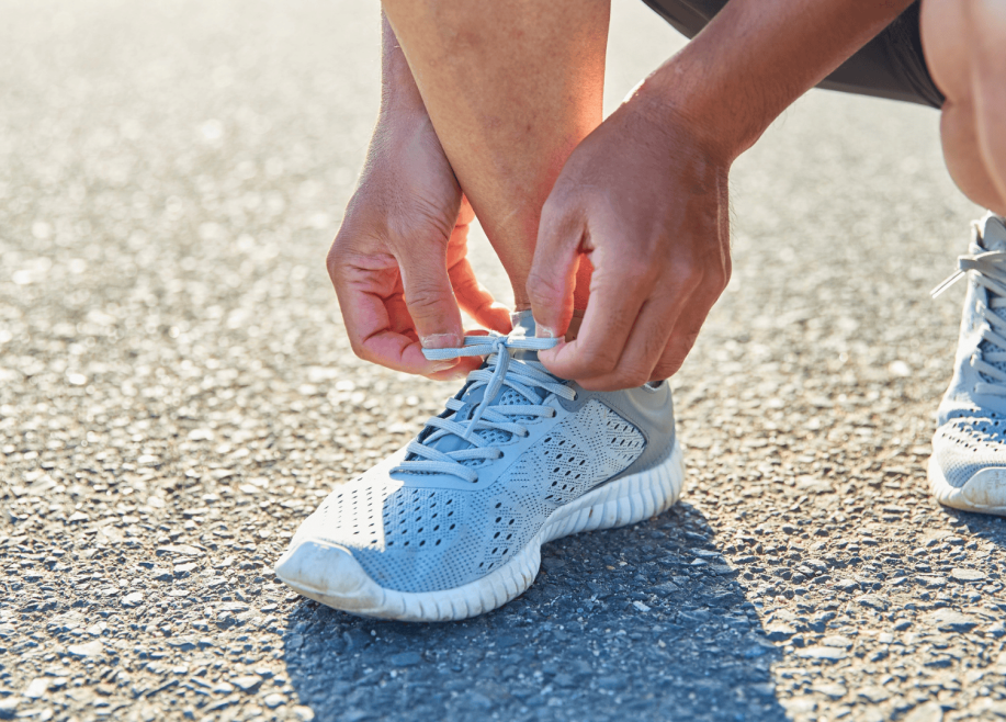Tying running shoe