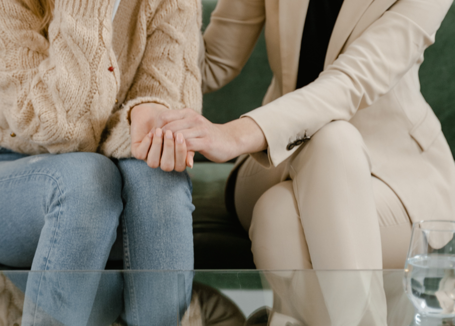 Women consoling. 